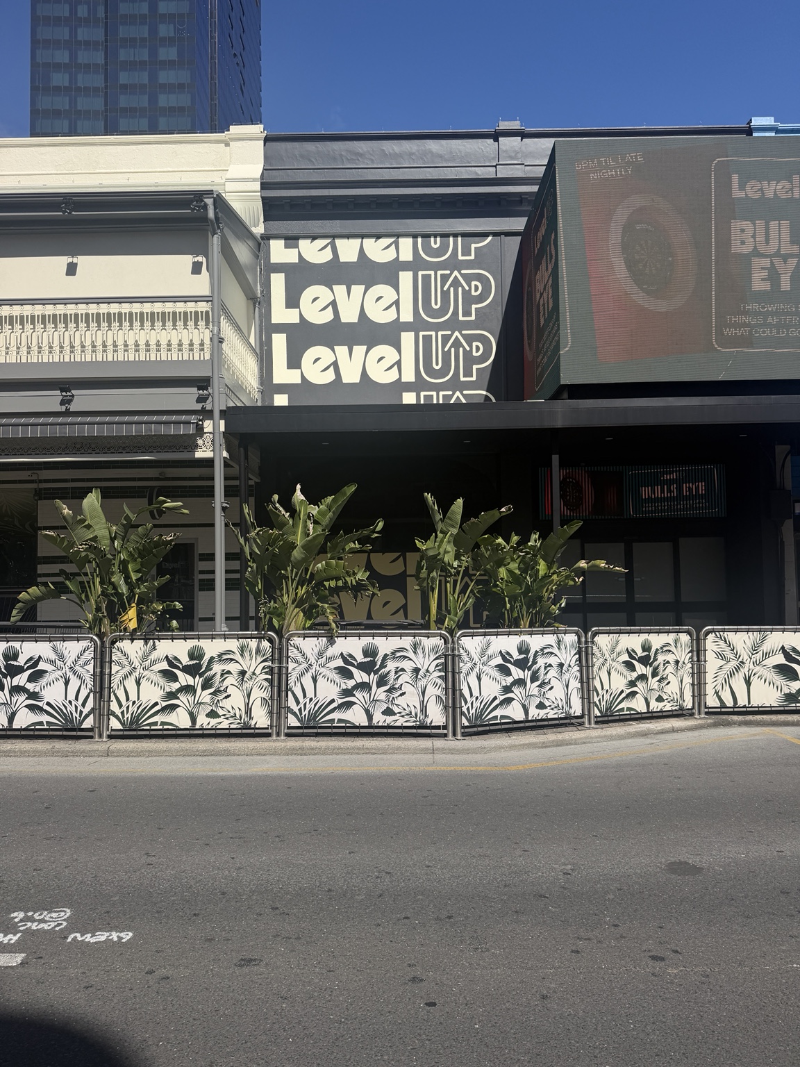 A full view of shopfront signage and window graphics