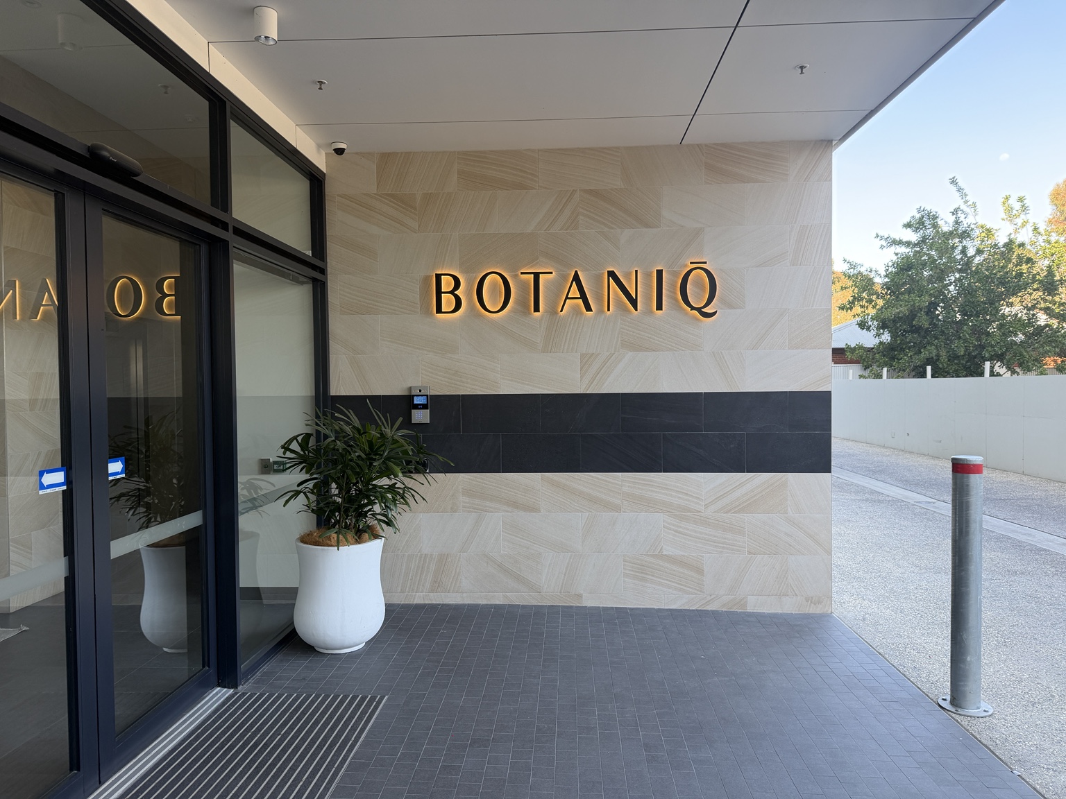 Finished wall lettering at a building entrance